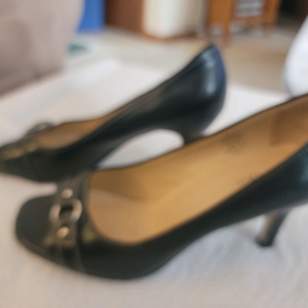 Navy heels 2 1/2 in.heel, open toes. East 5th. Silver buckle across toes.